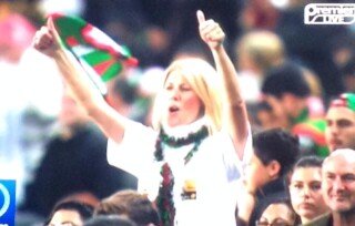 Julie Burgess live on Premier Sports wearing her L6ve Life tshirt